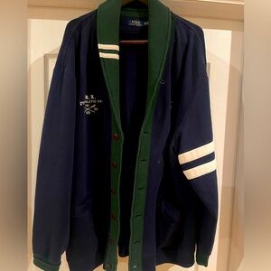 This is a button down Polo sweater, Navy blue.